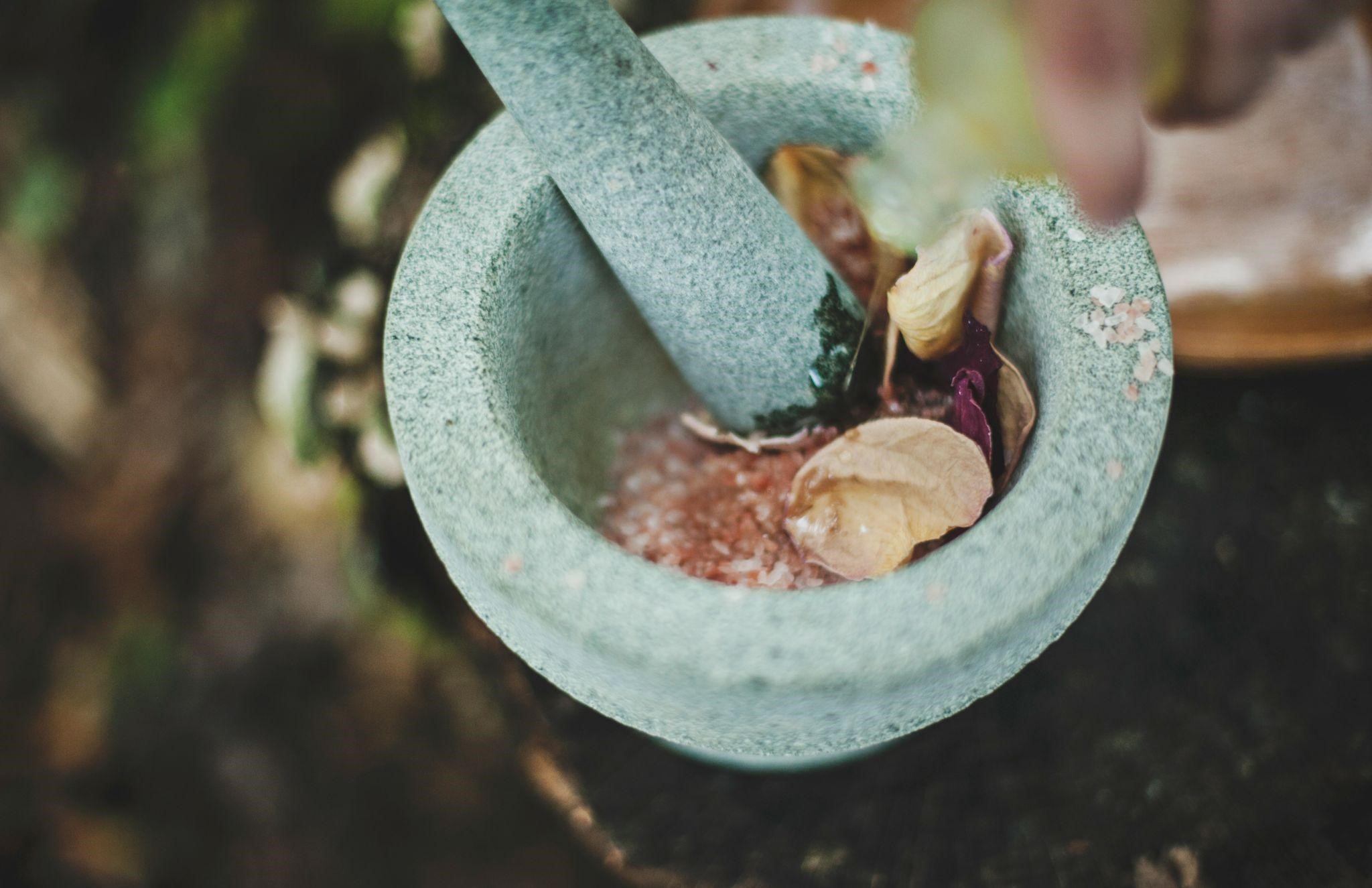 Chinese herbs in mortar and pestle